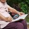 picture of old lady using magnifying glass