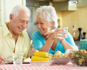 senior couple eating together