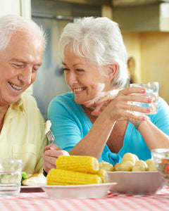 senior couple eating together