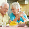 senior couple eating together