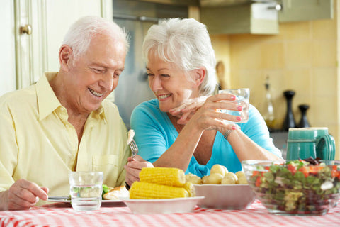 senior couple eating together