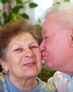 Eldelry couple working in the house