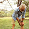 older man holding his injured knee