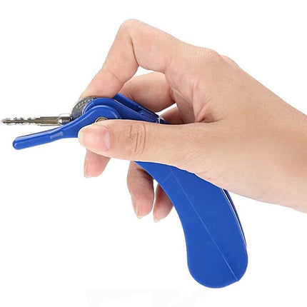 Hand holding a blue Key Turning Aid, designed for easy key turning with a comfortable grip.