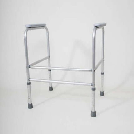 Aluminium toilet frame with adjustable height and armrests, designed for user support and stability.