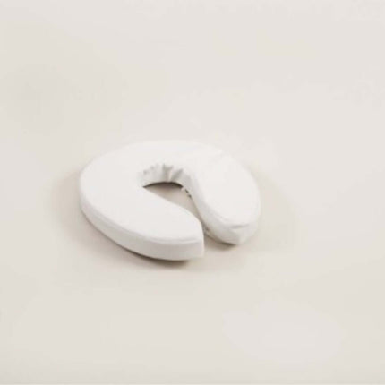 Atlantis padded raised toilet seat for added comfort and ease, featuring a washable white vinyl cover.