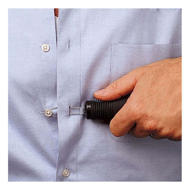 Person using Big Grip Button Hook to easily button a shirt with a cushioned grip handle.