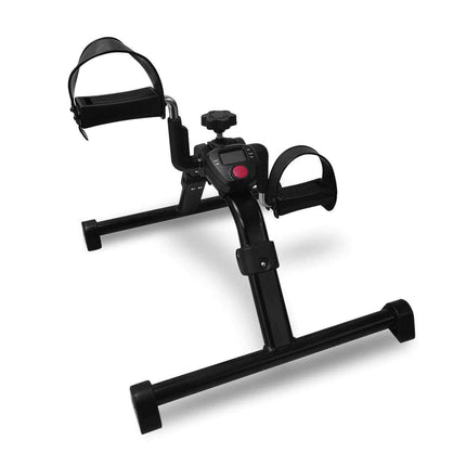 Foldable pedal exerciser with digital monitor for home cardio and muscle strengthening.