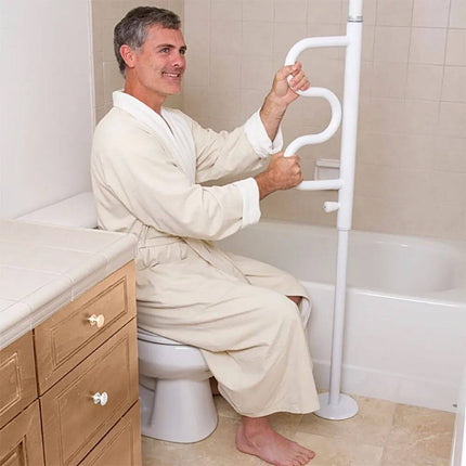 Man in bathrobe using Security Pole with Curved Grab Bar for support in the bathroom.