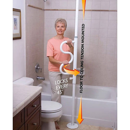 Woman using a floor-to-ceiling tension-mounted security pole with a curved grab bar in a bathroom setting.